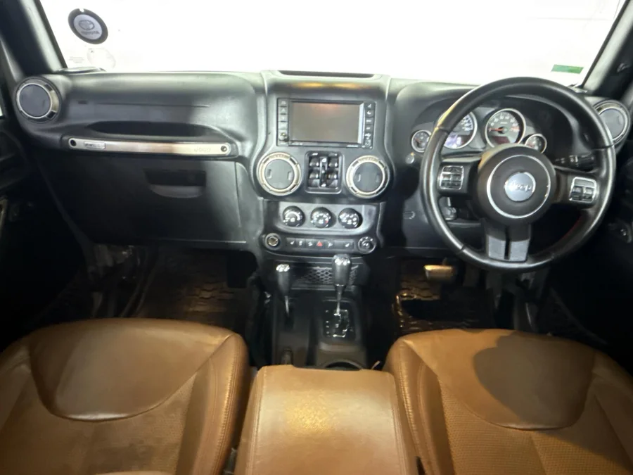 Used 2016 Jeep Wrangler Unlimited Sahara 3.6L 75th Anniversary Edition - WeBuyCars Midstream