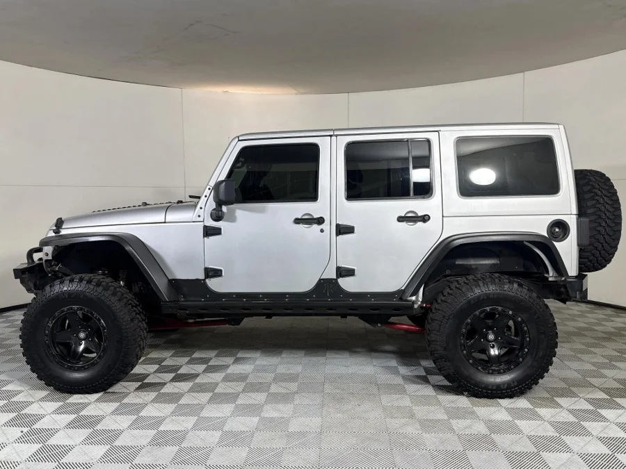 Used 2012 Jeep Wrangler Unlimited Sahara 3.6L 75th Anniversary Edition - WeBuyCars Midstream