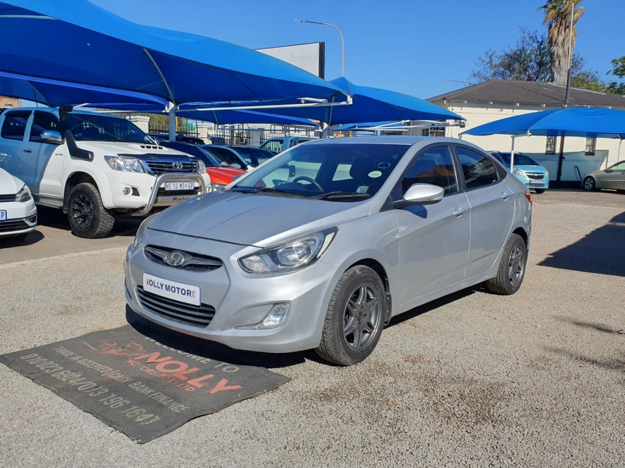 Used 2013 Hyundai Accent sedan 1.6 Fluid auto - Nolly Motors