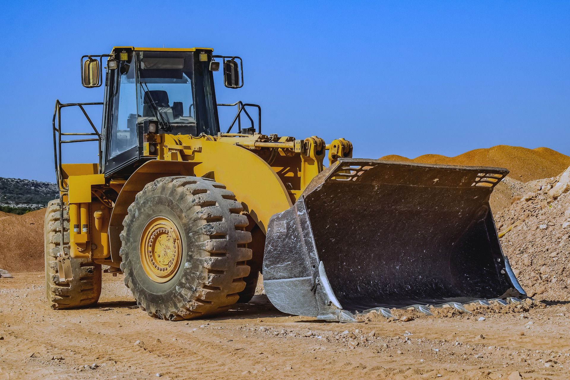 bulldozer-g1cb3a1380_1920.jpg