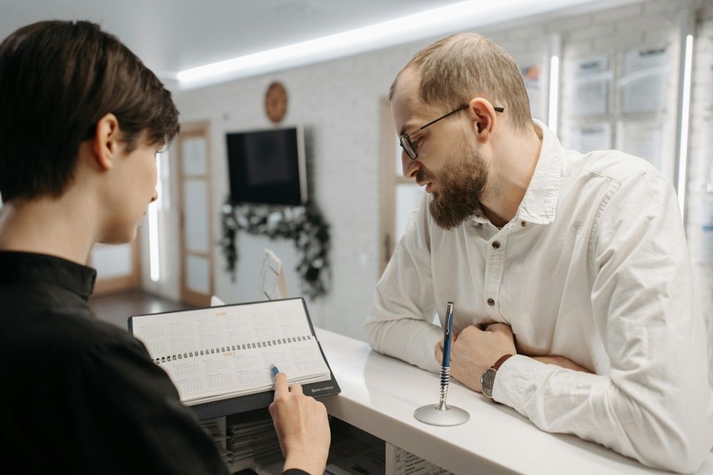 multitasking and efficiency as a receptionist, receptionist jobs, switchboard and reception on Job Mail, Photo by Pavel Danilyuk on Pexels.jpg