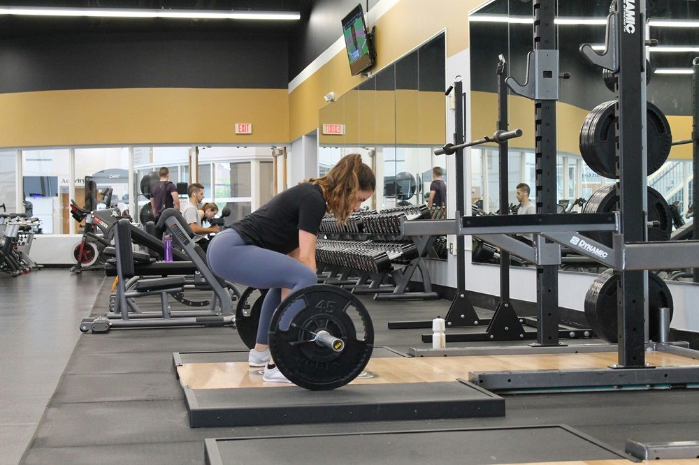 types of weight training, weight training exercises, sports on Junk Mail, sports equipment, sports equipment, Photo by Danielle Cerullo on Unsplash.jpg