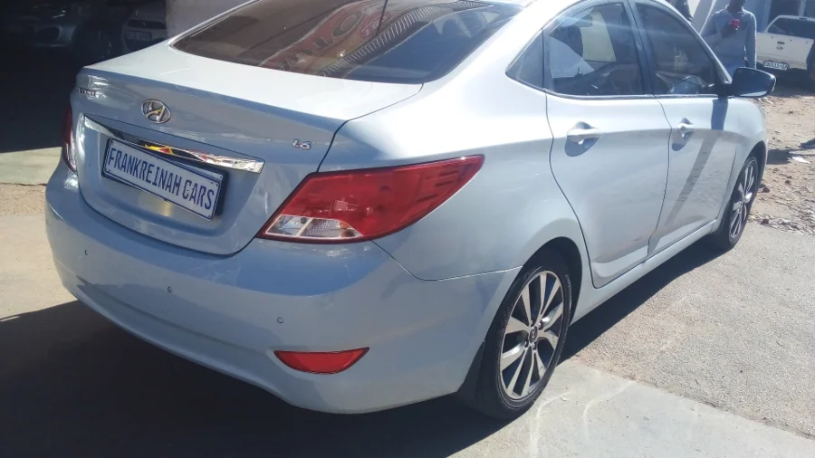 Used  2013 Hyundai Accent sedan 1.6 Fluid auto - Frank Reinah Auto Investments